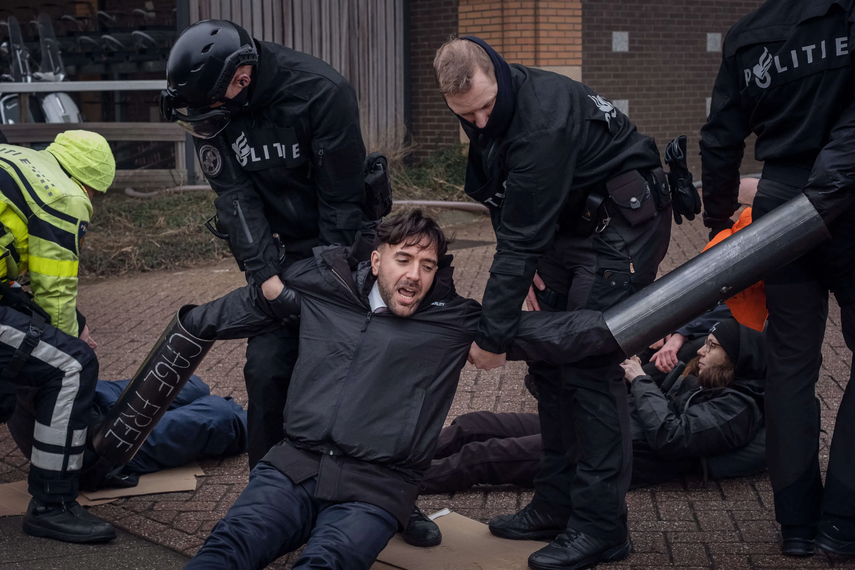 Animal rights activists arrested by police at Ahold Delhaize headquarters after cage-free protest