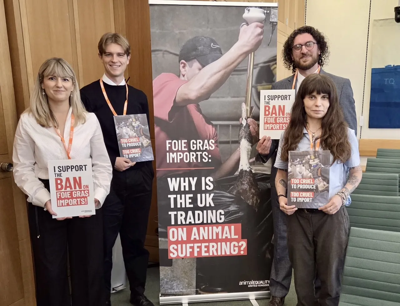 AE team in front of foie gras banner