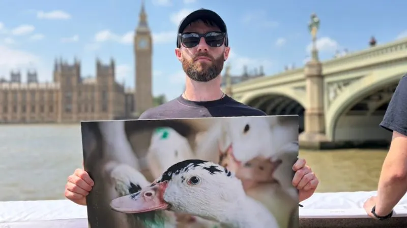 Volunteer with foi gras poster