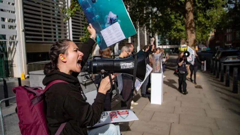Activist at fish protest - Defra